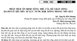 Phân tích ổn định tổng thể của đê chắn sóng đá đổ có xét đến áp lực nước khe rỗng trên nền đất